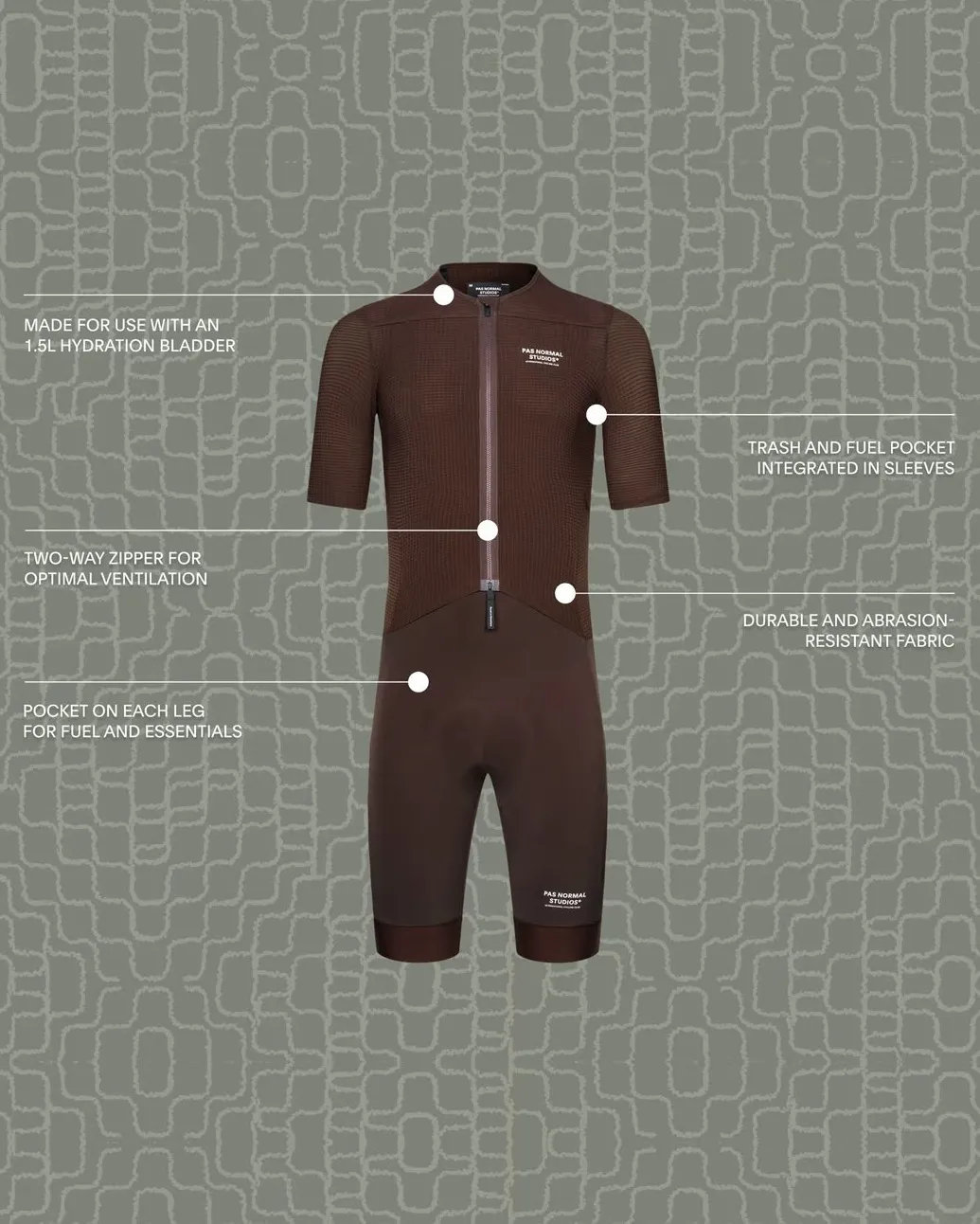 Pas Normal Studios Escapism speedsuit with callouts: made for use with a 1.5L hydration bladder; trash and fuel pocket integrated in sleeves; two-way zipper for optimal ventilation; durable and abrasion-resistant fabric; pocket on each leg for fuel and essentials